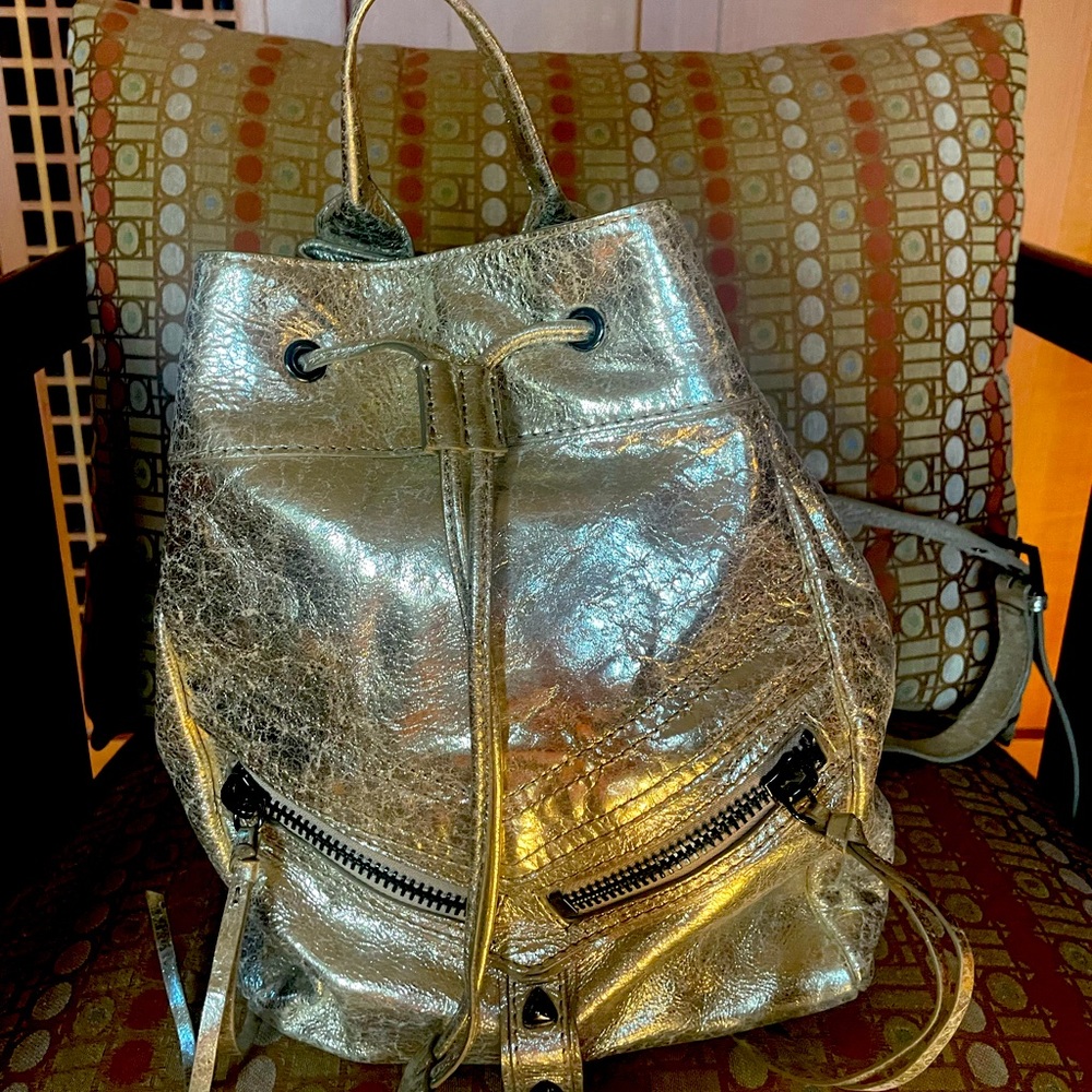Botkier gold metallic leather backpack. Great details. Top condition.